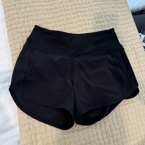 New without tags, Size 4, Speed Up High-Rise Lined Short 4", color black
